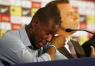 Barcelona's French defender Eric Abidal sheds a tear at a press conference in Barcelona on May 30, 2013